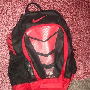 red and black nike vapor elite bag